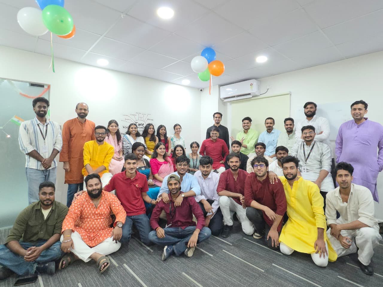 The DataCaffé team together at an office celebration